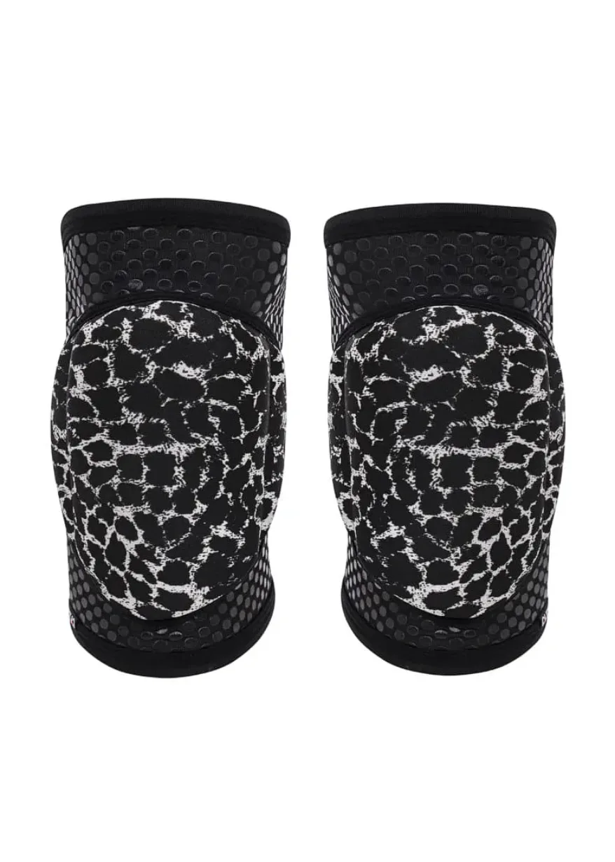 IMG_4289 Pair of black knee pads with white leopard print fronts, designed for protective wear during skating or biking