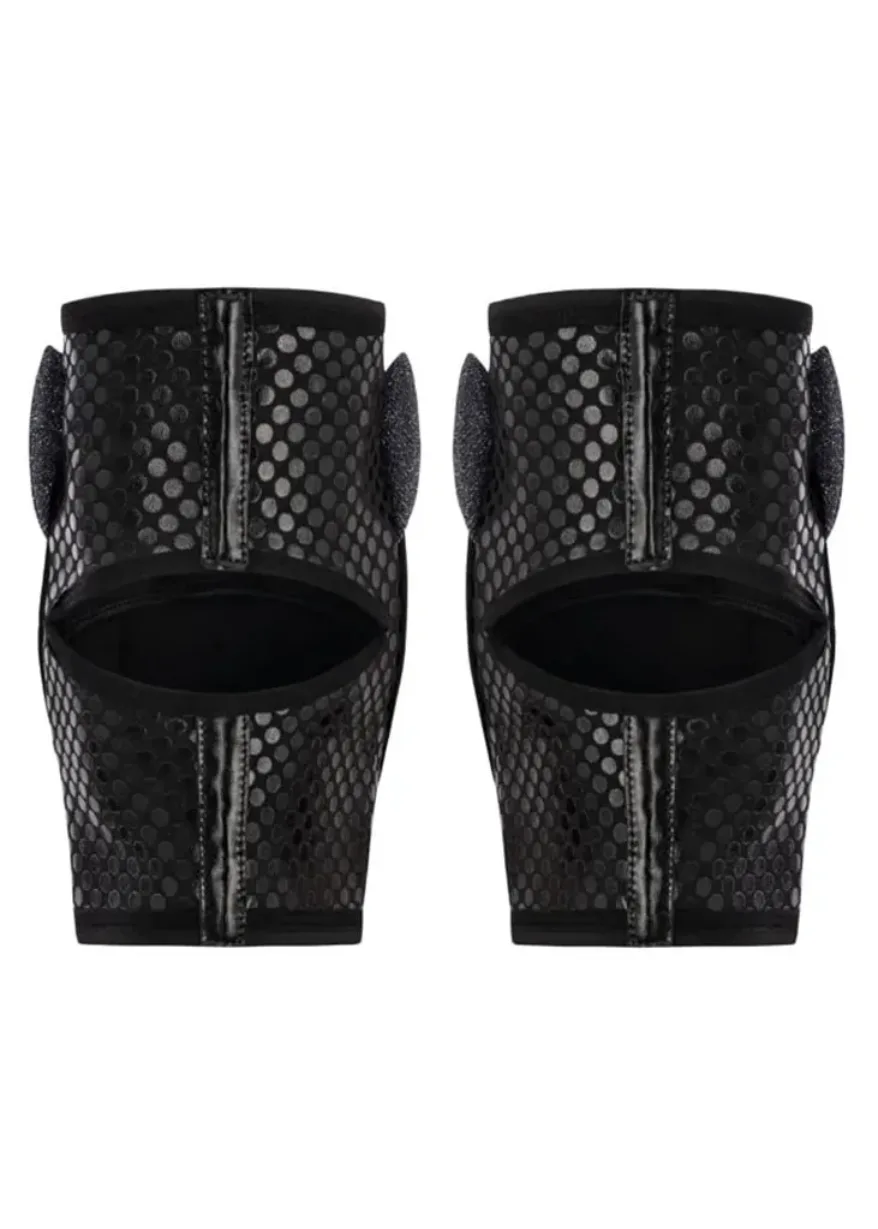IMG_4956 Pair of black, perforated heeled mules with a back zipper detail and circular dot pattern.