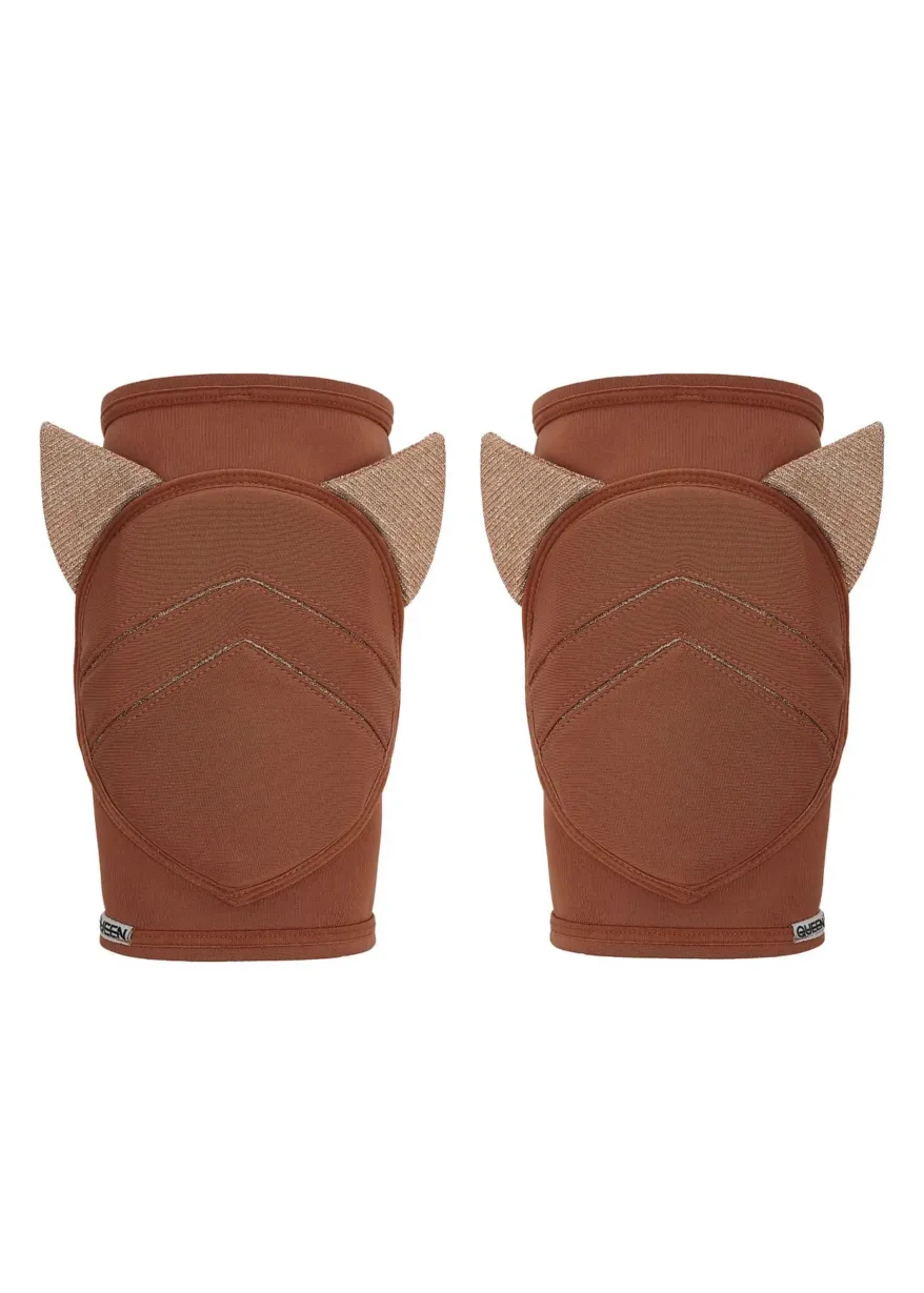 IMG_4555 Pair of brown equestrian leg wraps/boots with stitched chevron pattern and beige side panels on each; front view of both legs
