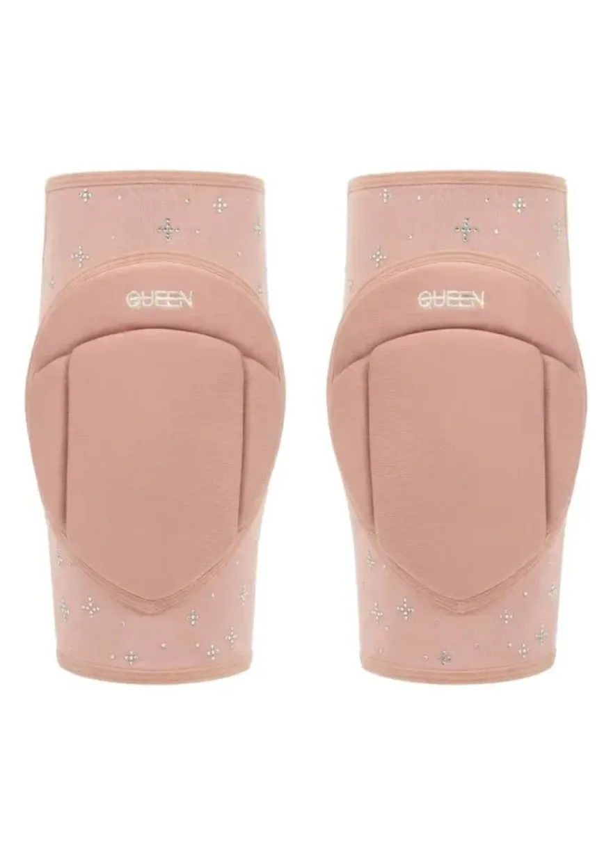 IMG_4948 Pink knee pads with small silver studs and 'GUESS' logo on each pad, designed for protective fashion wear at the knees.